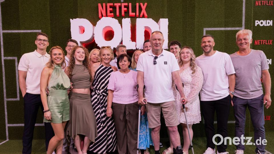 Familienmensch und Fußballer: die Podolskis bei der Premiere in Köln. (Archivbild) Bild: Rolf Vennenbernd/dpa