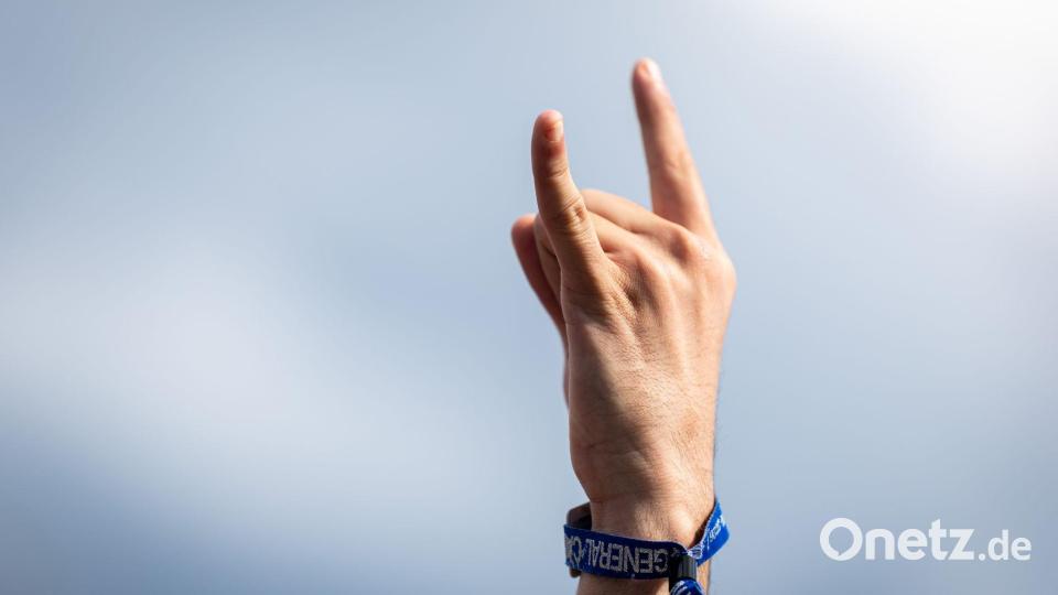 Rund 80.000 Musikfans feiern laut dem Veranstalter auf dem Gelände. Bild: Daniel Karmann/dpa