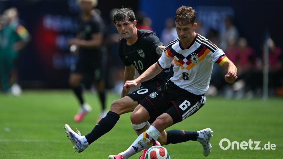 Joshua Kimmich im Zweikampf bei der WM-Generalprobe gegen die USA. Bild: Federico Gambarini/dpa