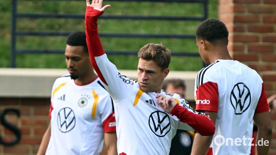 DFB-Kapitän Kimmich (m.) nimmt seine Kollegen in die Pflicht. Bild: Federico Gambarini/dpa