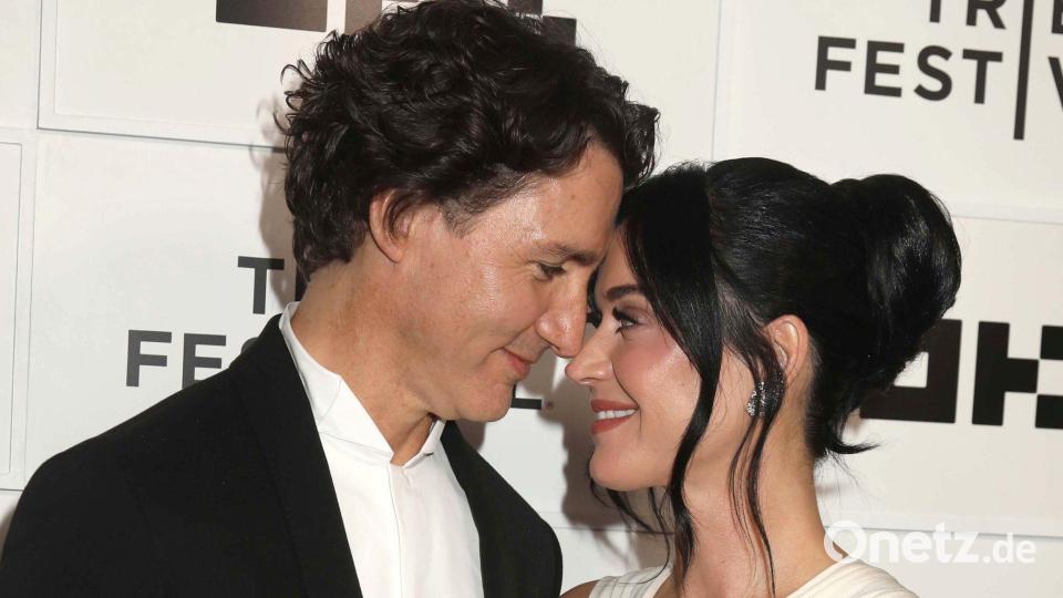 Justin Trudeau (l), ehemaliger kanadischer Premierminister, und US-Popstar Katy Perry kommen zur Premiere des Konzertfilms „Katy Perry: The Lifetimes Tour - Live from Paris“. Bild: Nancy Kaszerman/ZUMA Press Wire/dpa