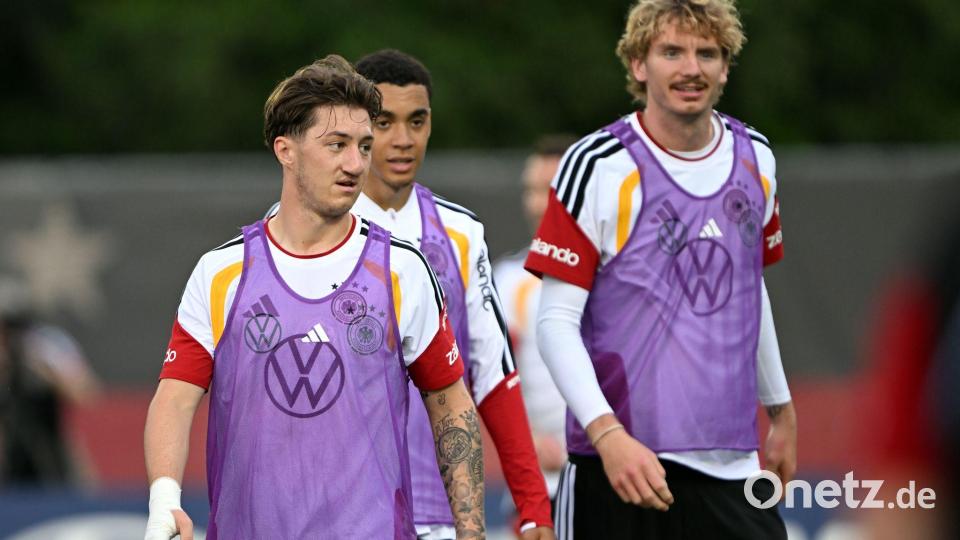 Nick Woltemade (r.) ist in der Nationalmannschaft nicht mehr in der Startelf gesetzt. Bild: Federico Gambarini/dpa