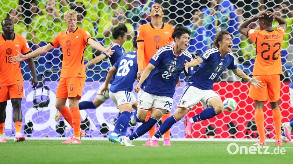 Japan freut sich über ein spätes Remis gegen die Niederlande. Bild: Julio Cortez/AP/dpa