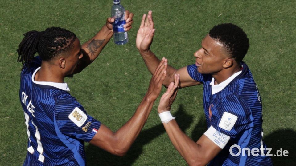 Frankreichs Beste gegen Senegal: Michael Olise (l.) und Kylian Mbappé. Bild: Adam Hunger/AP/dpa