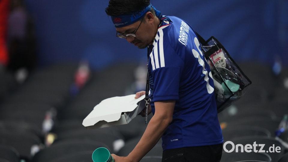 Müll im Stadion, Wäsche zu Hause: Japan streitet. (Archivbild) Bild: Julio Cortez/AP/dpa