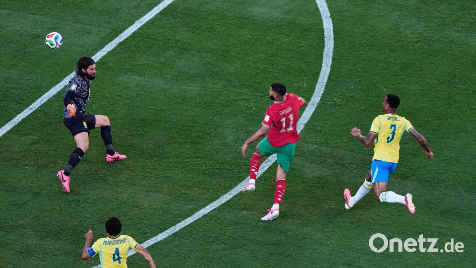 Ein Lupfer über Alisson: Ismael Saibari trifft gegen Brasilien. (Archivbild) Bild: Matt Slocum/AP/dpa