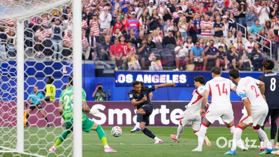 Die US-Fans hatten wieder früh einen Grund zum Jubeln. Bild: Mark J. Terrill/AP/dpa