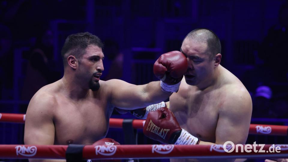 Interimstitel als Belohnung: Kabayel vs. Zhang. Bild: Wang Haizhou/XinHua/dpa