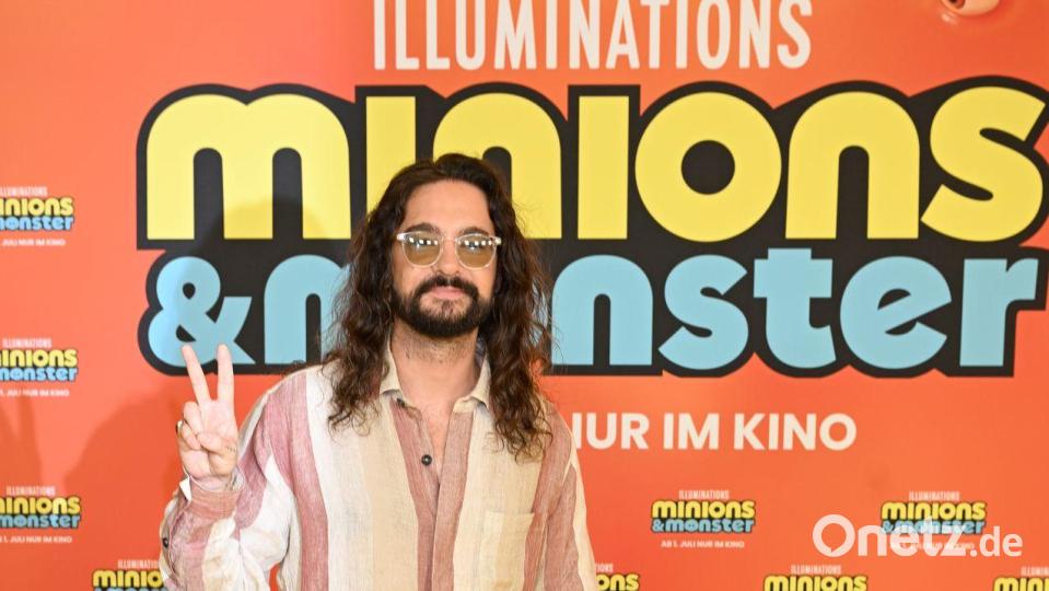 Tom Kaulitz leiht dem Roboter Dort seine Stimme. Bild: Felix Hörhager/dpa
