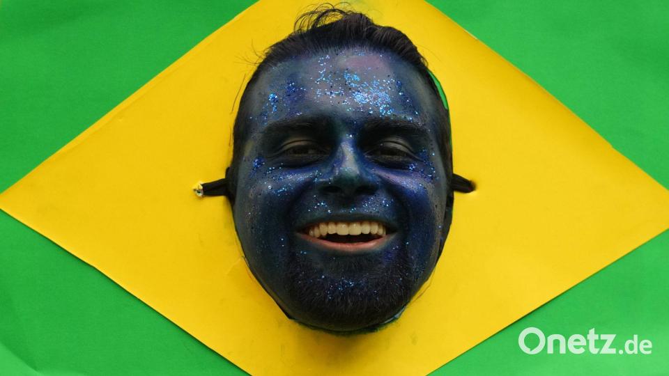 Fußball-WM - ein brasilianischer Fan feiert Bild: Ulrik Pedersen/ZUMA Press Wire/dpa