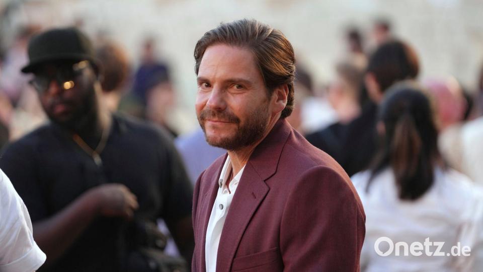Daniel Brühl übernimmt die Rolle von Voldemort. (Archivbild) Bild: Aurelien Morissard/AP/dpa