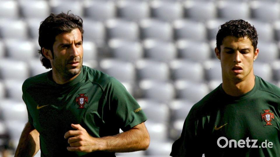 Zwei Legenden Portugals: Luis Figo (l) und Cristiano Ronaldo. (Archivbild) Bild: picture alliance / dpa