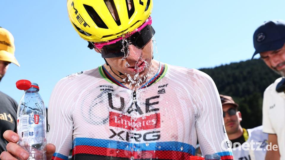 Auch Tour-Dominator Tadej Pogacar braucht viel Abkühlung in diesen Tagen. Bild: Anne-Christine Poujoulat/AFP via AP/dpa