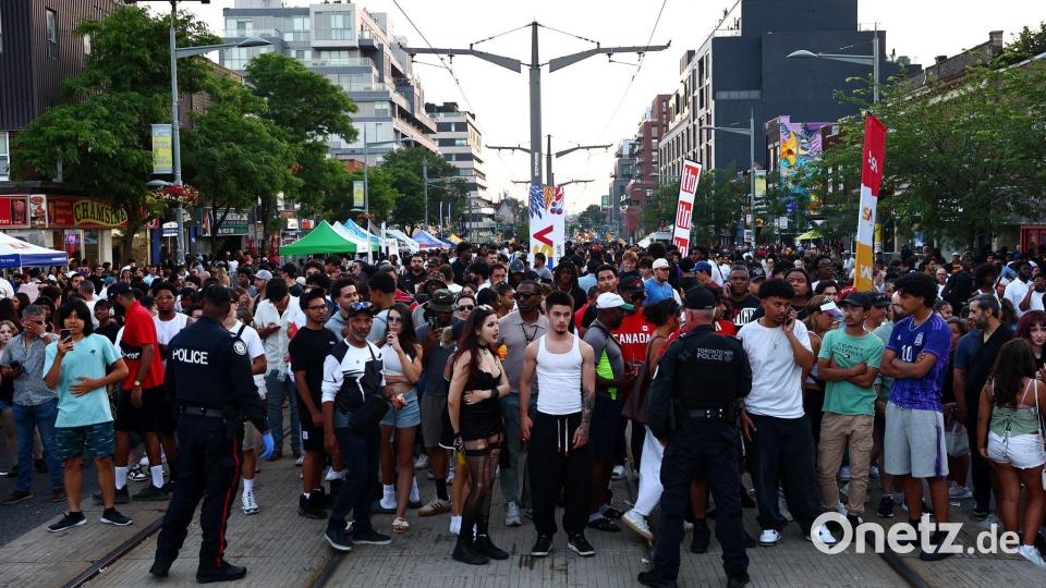 Die Menschen feierten auf der Straße. Bild: Keito Newman/The Canadian Press/AP/dpa