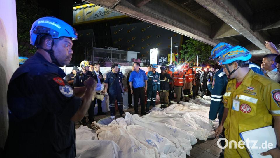 Opfer der Brandkatastrophe wurden mit Tüchern bedeckt. Bild: Sakchai Lalit/AP/dpa