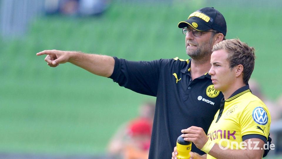 Einst erfolgreich bei Borussia Dortmund: Mario Götze (l) und Jürgen Klopp. (Archivbild) Bild: picture alliance / dpa