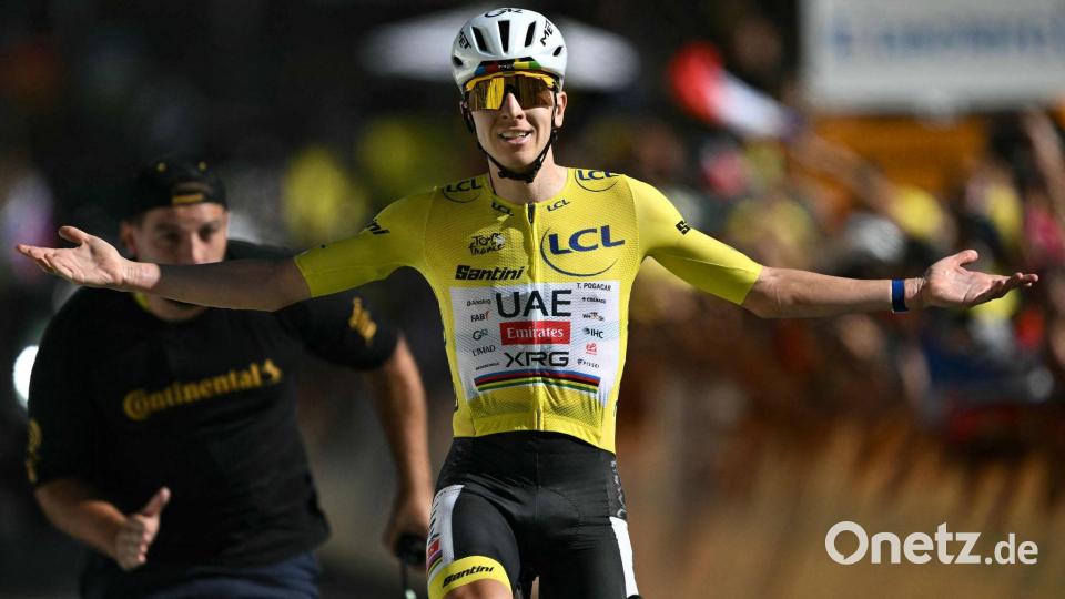Tadej Pogacar triumphiert in Alpe d'Huez. Bild: Jeff Pachoud/AFP/dpa