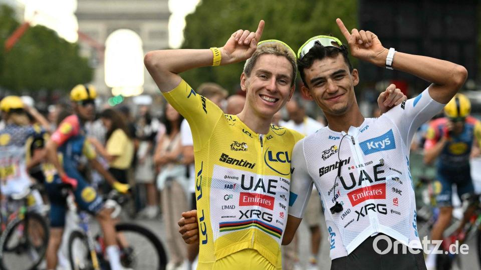 Pogacar und Del Toro feiern nach der Tour de France Bild: Jeff Pachoud/AFP/dpa