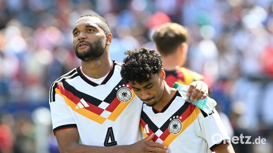 Jonathan Tah (l) und Nathaniel Brown. Archivbild: Federico Gambarini/dpa