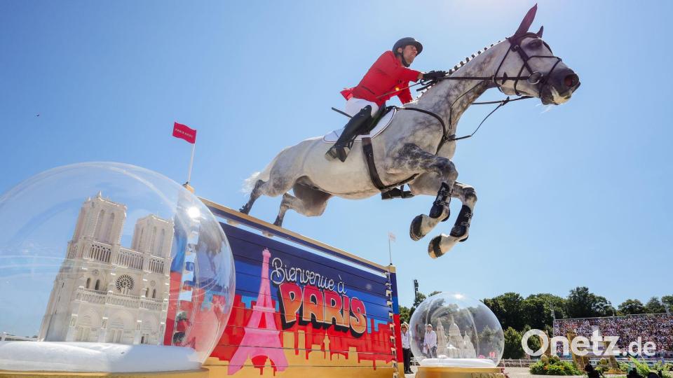 Sprung zum Gold: Christian Kukuk und Checker. (Archivbild) Bild: Rolf Vennenbernd/dpa