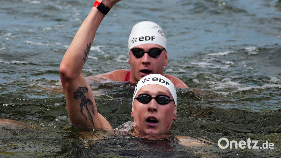 Mit einem starken Schlussspurt sicherte sich Florian Wellbrock nach zehn Kilometern den Sieg in der Seine. Bild: Dimitar Dilkoff/AFP/dpa