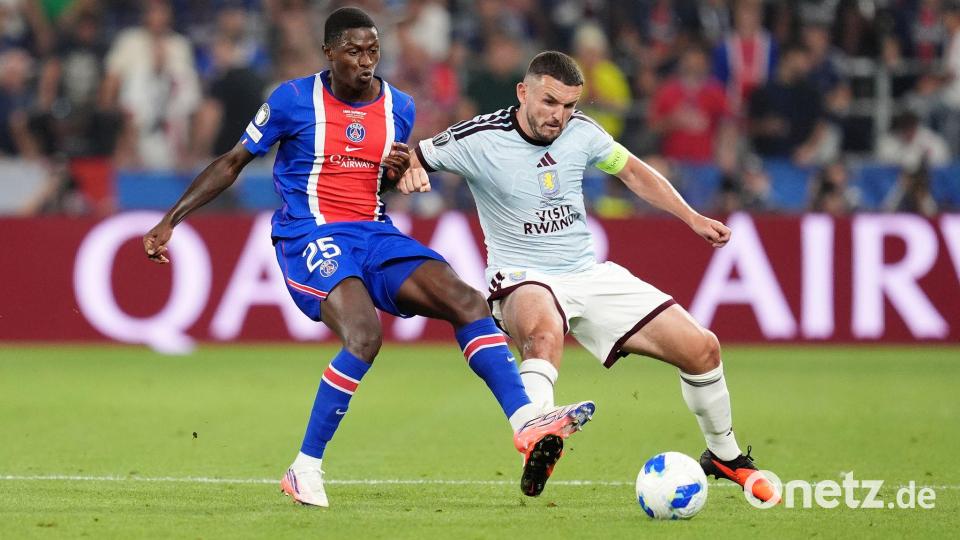 Nun Mendes von Paris Saint-Germain (links) und Aston-Villa-Profi John McGinn kämpfen um den Ball. Bild: Adam Davy/PA Wire/dpa