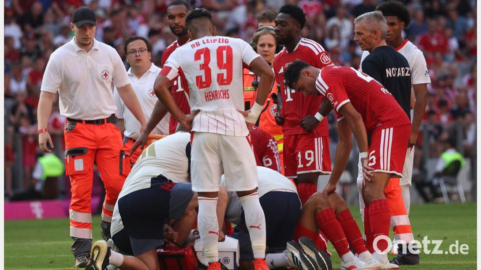 Die Sorge um Musiala (verdeckt) war groß. Bild: Karl-Josef Hildenbrand/dpa