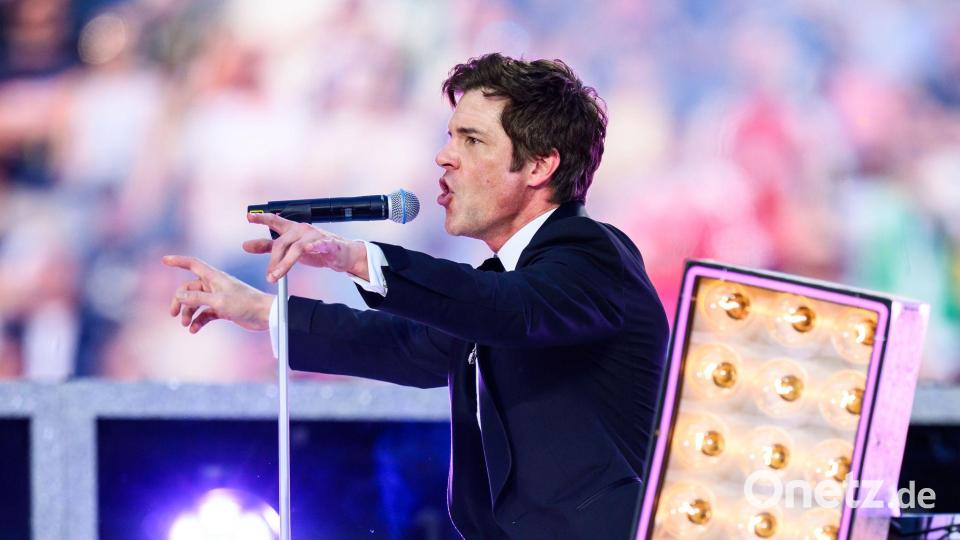 Trat mit den Killers im Mai bei der Champions League auf: Brandon Flowers. (Archivbild) Bild: Tom Weller/dpa