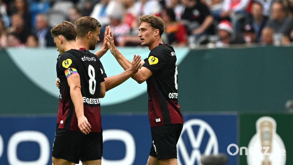 Der SC Freiburg jubelt über das Tor zum 1:0. Bild: Federico Gambarini/dpa