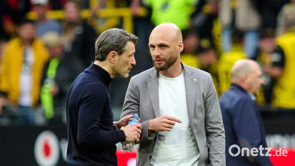Kommen gut miteinander aus: Kovac und Book. (Archivbild) Bild: Bernd Thissen/dpa