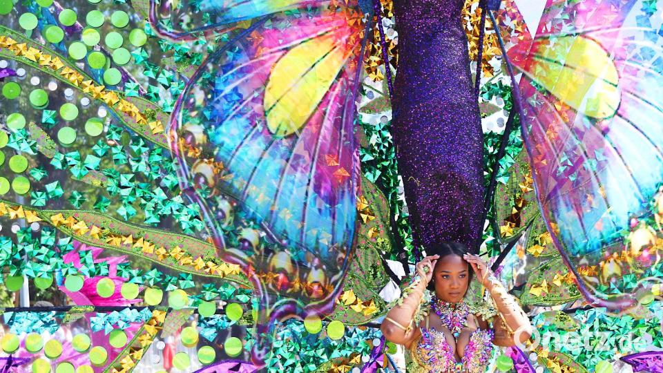 Prächtig geschmückt sind Teilnehmer der West Indian Day Parade am Labor Day Bild: Heather Khalifa/AP/dpa