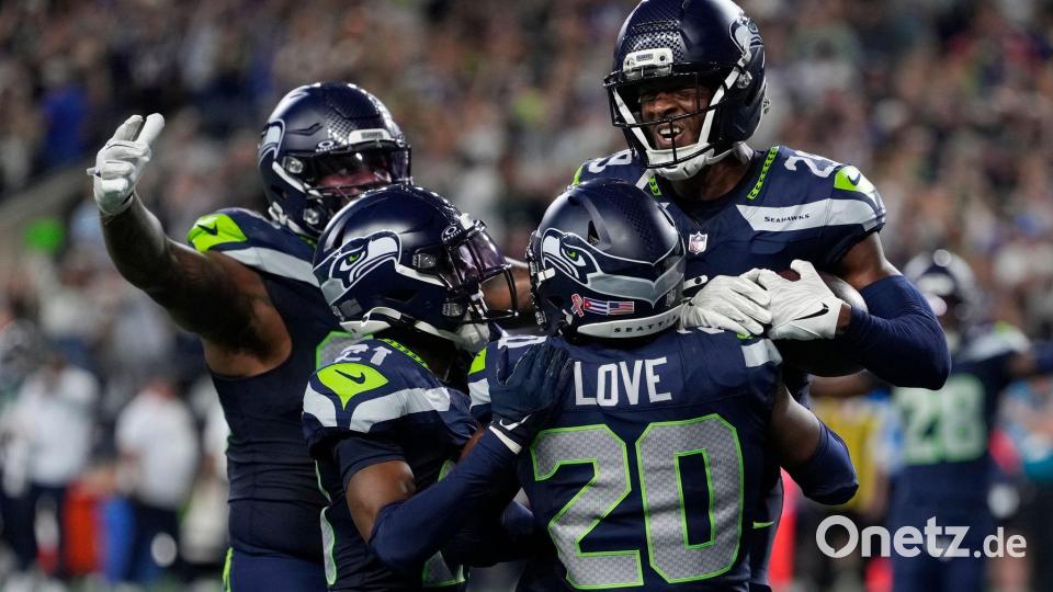 Die Seahawks ließen nach dem entscheidenden Ballgewinn der Freude freien Lauf. Bild: Stephen Brashear/AP/dpa