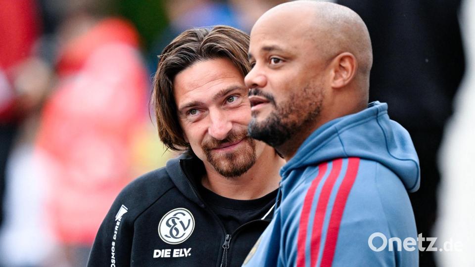 Elversberg-Trainer Vincent Wagner (l) durfte nach der Aufhebung seiner Gelb-Rot-Sperre gegen den FC Bayern München auf der Bank sitzen. Bild: Uwe Anspach/dpa