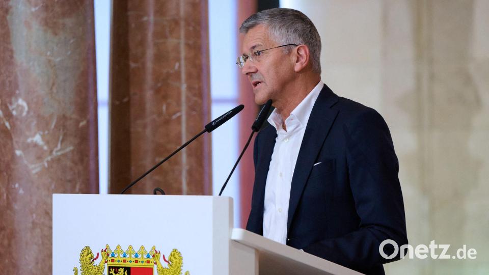 Herbert Hainer nutzt den Empfang in der Staatskanzlei zu einem Appell. Bild: Sven Hoppe/dpa