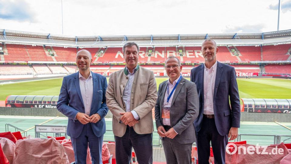 Werben für Nürnberg als Finals-Gastgeber: Bürgermeister Kriegelstein, Ministerpräsident Söder, Landessportbund-Chef Ammon und FCN-Vorstand Rossow (v.l.n.r.) Bild: Pia Bayer/dpa