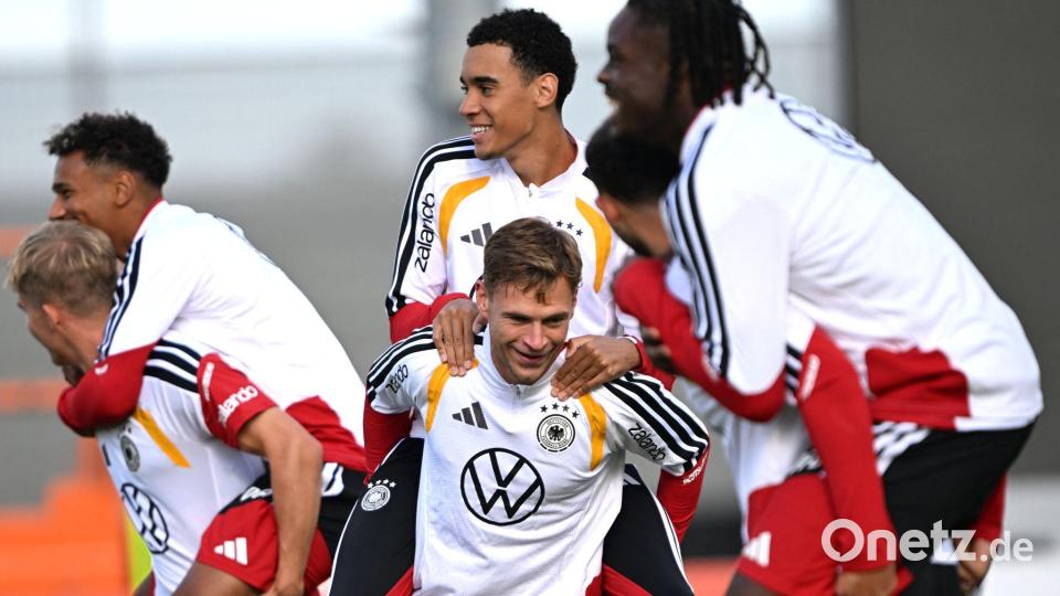 DFB-Kapitän Kimmich (M) möchte in der Nationalmannschaft weiter vorangehen. Bild: Federico Gambarini/dpa