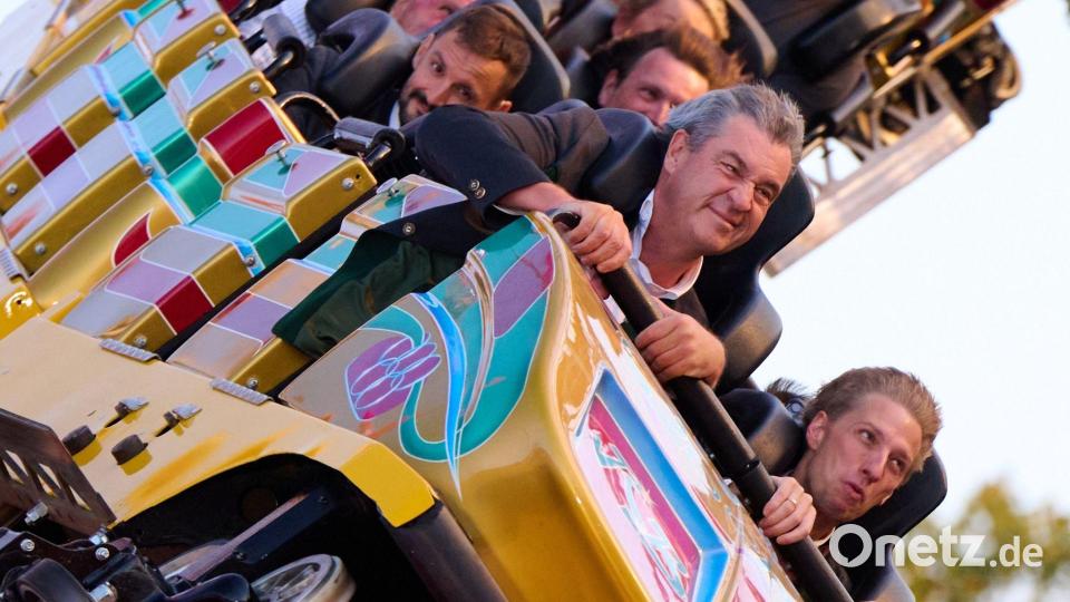 Markus Söder und Dominik Krause feiern Münchens Nominierung als deutscher Olympia-Bewerber auf dem Oktoberfest. Bild: Sven Hoppe/dpa