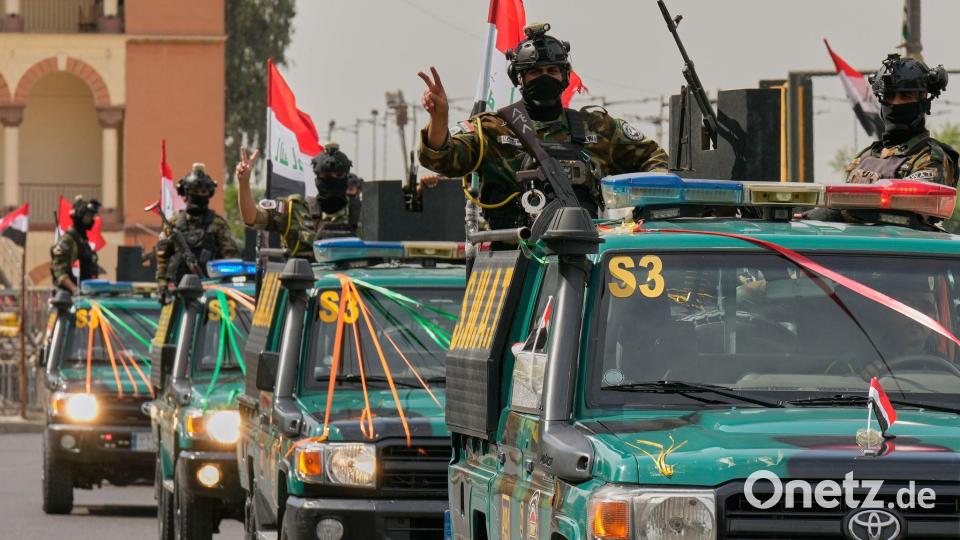 Im Irak wird der US-Truppenabzug als „Tag der Unabhängigkeit“ gefeiert. Bild: Hadi Mizban/AP/dpa