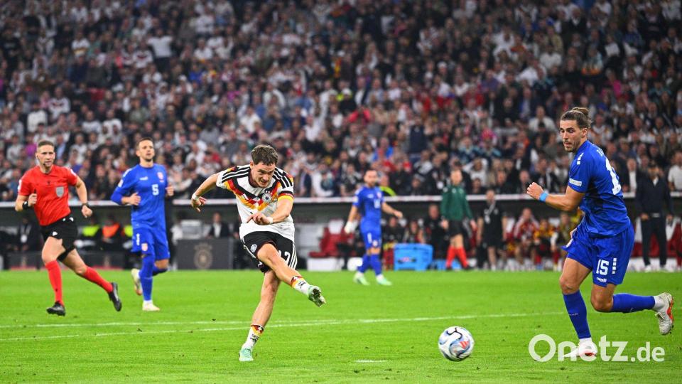 Florian Wirtz nimmt Maß und trifft zum 2:0 - als Kapitän. Bild: Tom Weller/dpa
