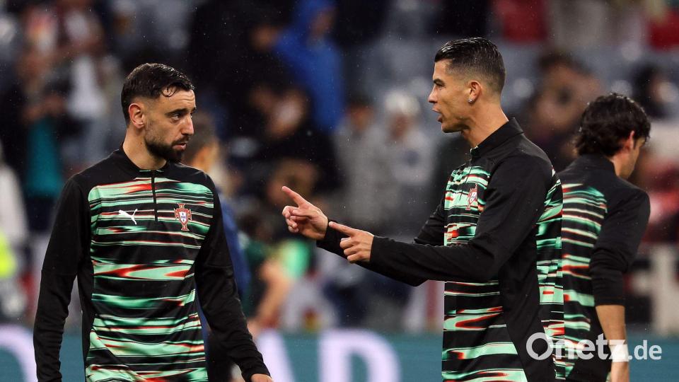 Spielt wohl nicht mehr mit Ronaldo in der Auswahl: Bruno Fernandes (l). (Archivbild) Bild: Christian Charisius/dpa