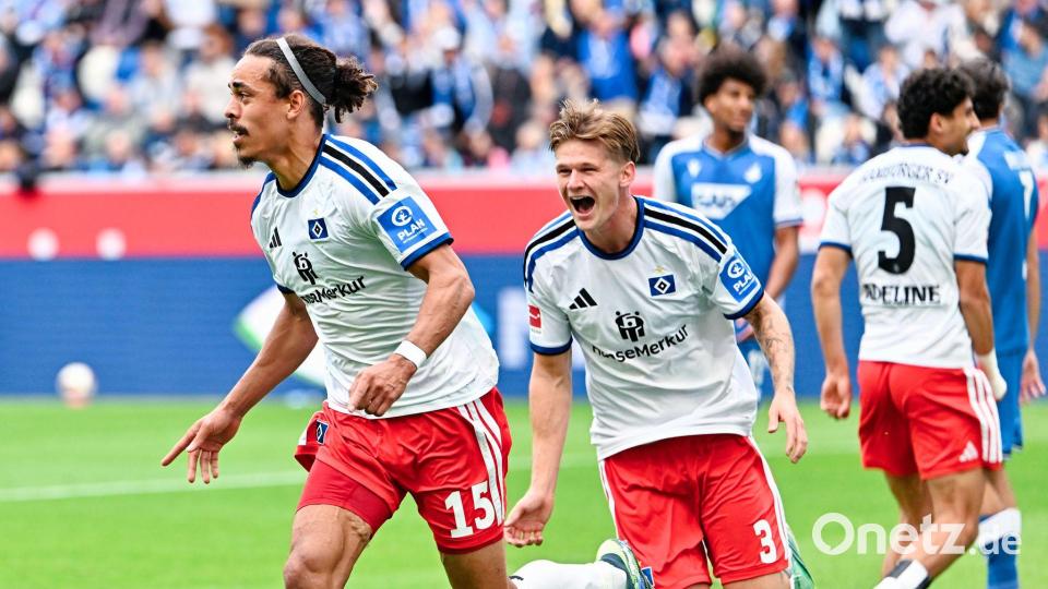 Yussuf Poulsen (l.) geht als Torschütze beim HSV voran. Bild: Uwe Anspach/dpa
