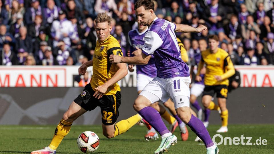 Jonas Sterner (links, Dynamo Dresden) im Zweikampf mit Robin Meißner (VfL Osnabrück). Bild: David Ebener/dpa