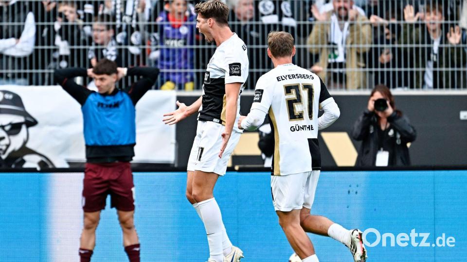 Maximilian Rohr (l) jubelt über sein Tor zum 3:0 für Elversberg Bild: Uwe Anspach/dpa