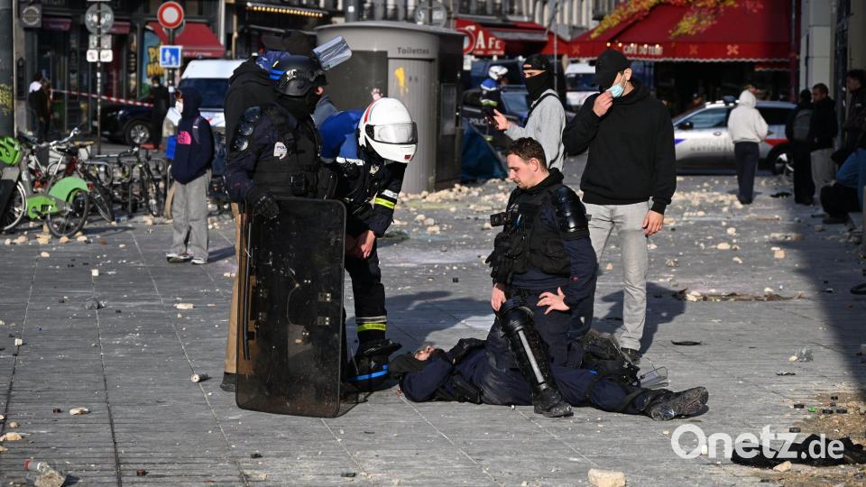 60 Polizisten wurden bei den Demonstrationen verletzt. Bild: Emma Da Silva/AP/dpa