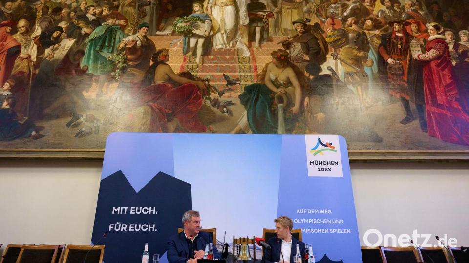 Söder (l) und Münchens Oberbürgermeister Dominik Krause wollen das Olympia-Projekt beschleunigen. Bild: Sven Hoppe/dpa