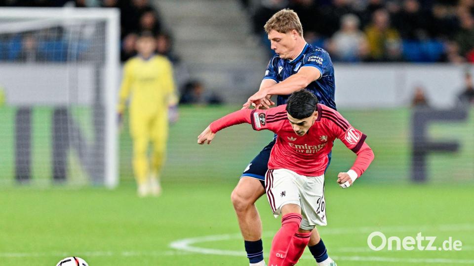 Hoffenheims Alexander Prass macht Druck gegen Olympique Lyon. Bild: Uwe Anspach/dpa