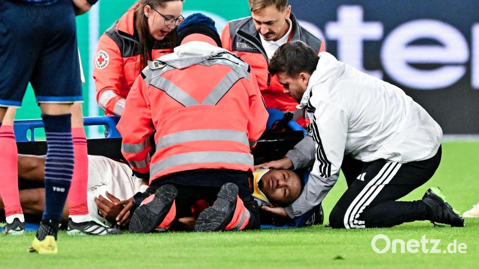 Lange Behandlungspause für Lyons Steeve Kango. Bild: Uwe Anspach/dpa