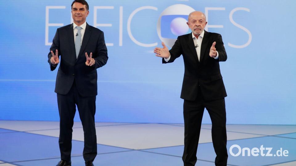 Präsident Luiz Inácio Lula da Silva (r) und Senator Flávio Bolsonaro bei einer Präsidentschaftsdebatte . Bild: Bruna Prado/AP/dpa
