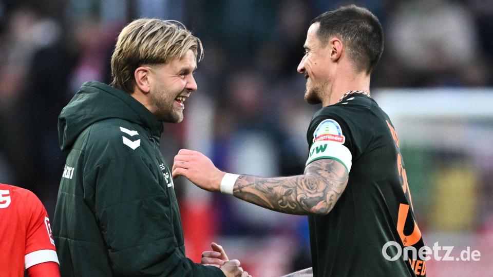 Niclas Füllkrug (l) sieht die Debatte um ein mögliches DFB-Comeback entspannt. Bild: Florian Wiegand/dpa