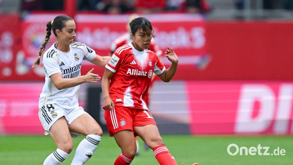 Weiß gegen Rot: Sara Däbritz (l) gastiert mit Real Madrid bei den Münchnerinnen um Momoko Tanikawa. (Archivbild) Bild: Sven Hoppe/dpa